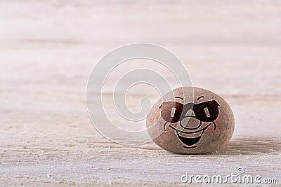 Smiling emoticon with sunglasses Stock Photo