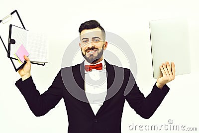 Smiling employer in classic black suit and red bow tie Stock Photo
