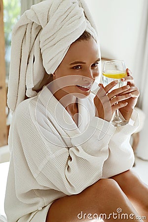 Smiling european girl drink lemonade after spa Stock Photo
