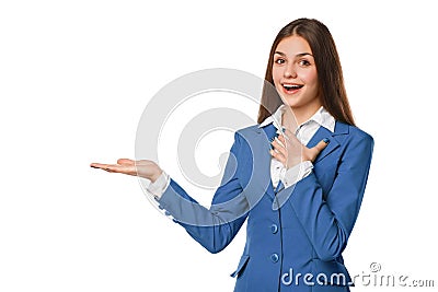 Smiling excited woman showing open hand palm with copy space for product or text. Business woman in blue suit, isolated over white Stock Photo