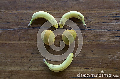 A smiling face made out of various fruits Stock Photo