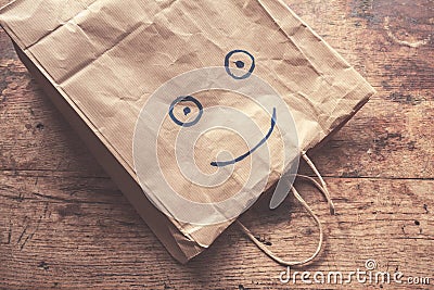 Smiling face on paperbag Stock Photo