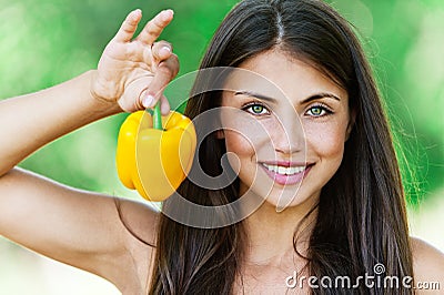 Smiling fair-haired woman holding Stock Photo