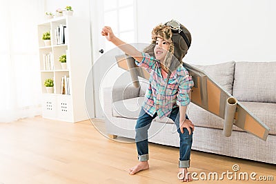 Smiling female children wearing astronaut costume Stock Photo