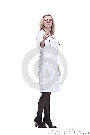 Smiling female medic pointing at you. isolated on a white Stock Photo