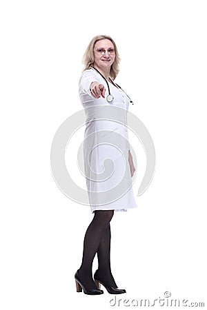 smiling female medic pointing at you. isolated on a white Stock Photo