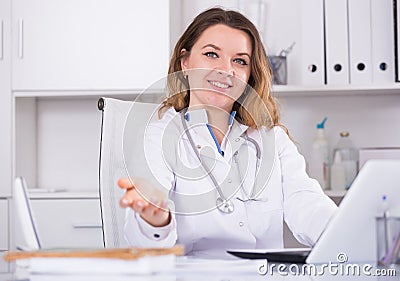 Smiling female medical working Stock Photo