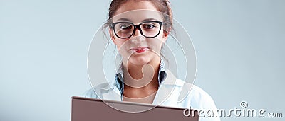 Woman in lab coat gives crucial advice Stock Photo