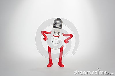 Smiling funny character created from incandescent bulb and plasticine Stock Photo
