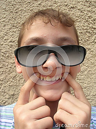 Smiling funny teenager Stock Photo