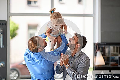 Smiling gay couple with child Stock Photo