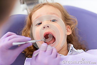Smiling girl at dentist Stock Photo