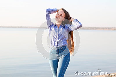 Smiling girl with long hair Stock Photo