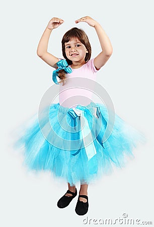 Smiling Girl Performing in Tutu Skirt Stock Photo