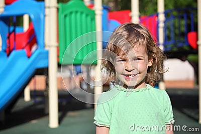 Smiling girl on playground Stock Photo