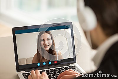 Smiling girl on video call with guy, virtual chat online Stock Photo