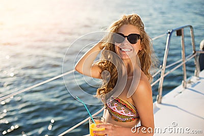 Smiling girl on yacht. Stock Photo