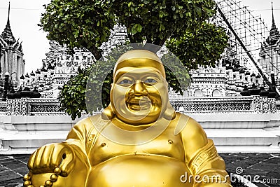 Smiling Golden Buddha Statue Stock Photo