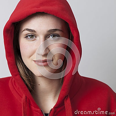 Smiling gorgeous 20s female student wearing red sportwear clothes Stock Photo