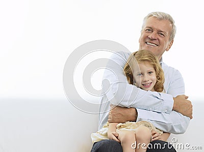 Smiling Grandfather & Granddaughter Stock Photo