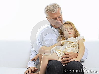 Smiling Grandfather & Granddaughter Stock Photo