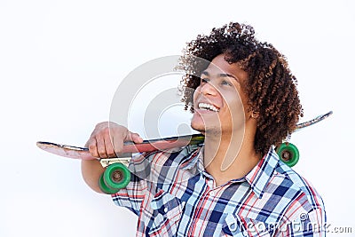 Smiling guy with skateboard on isolated white background Stock Photo