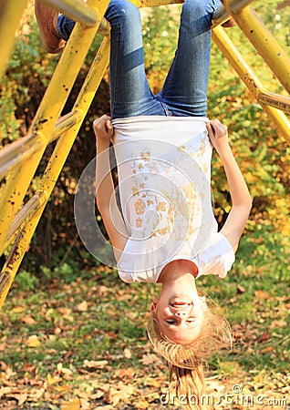 Smiling hanging girl Stock Photo