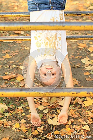 Smiling hanging girl Stock Photo