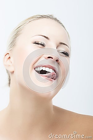 Smiling and Happy Caucasian Woman Beauty Face Closeup Portrait Stock Photo