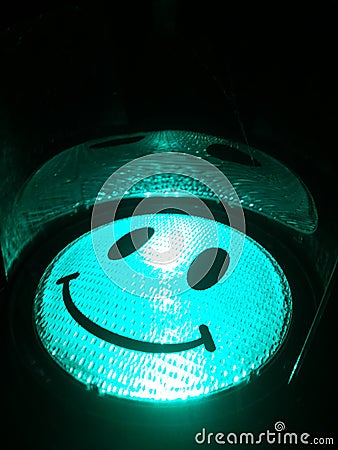 Smiling happy green traffic light Stock Photo