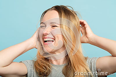 Happy woman playing hair beauty confidence Stock Photo