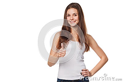 Smiling happy young woman showing thumbs up, isolated on white background Stock Photo