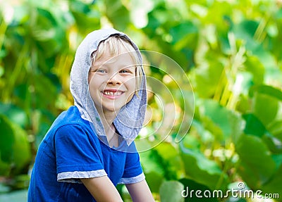 Smiling, healthy child in nature Stock Photo