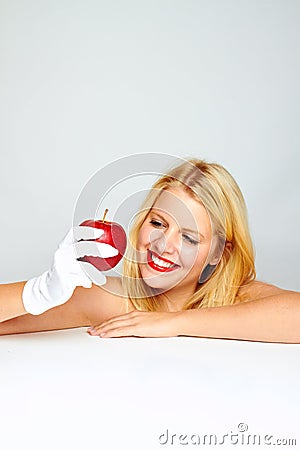 Smiling healthy woman with apple Stock Photo