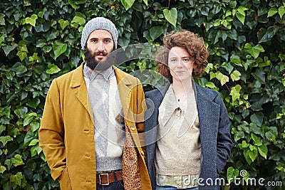 Smiling hipster student couple Stock Photo