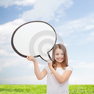 Smiling little girl with blank text bubble Stock Photo