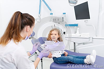 Smiling little patient at dentist Stock Photo