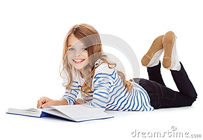 Smiling little student girl lying on the floor Stock Photo