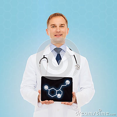 Smiling male doctor showing tablet pc screen Stock Photo