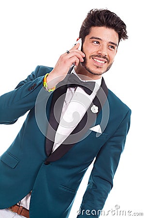 Smiling man in conversation on the mobile Stock Photo