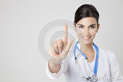 Smiling medical doctor woman. Focus on hand Stock Photo