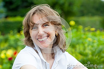 Smiling middle age woman portrait Stock Photo