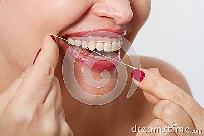 Smiling middle aged woman with ideal strong white teeth, teethcare. Selective focus. Healthcare, stomatological concept for dentis Stock Photo