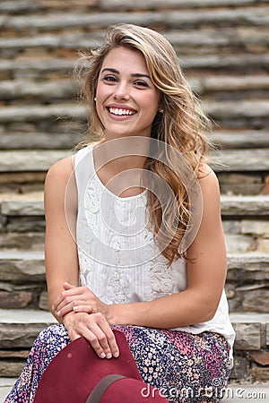 Smiling Model During an Outdoor Photoshoot Stock Photo