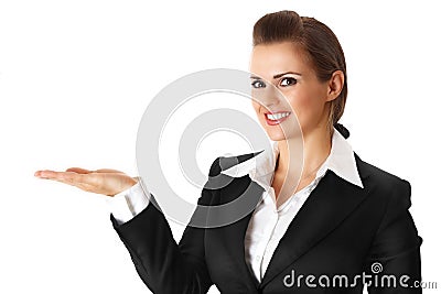 Smiling modern business woman presenting something Stock Photo