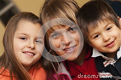 Smiling mother and children Stock Photo