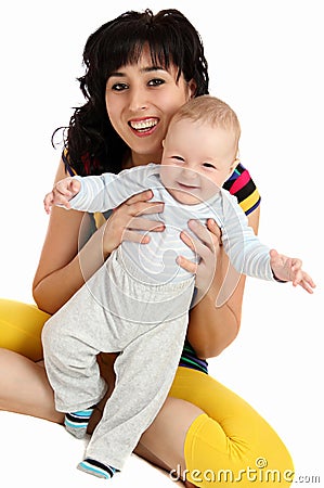 Smiling mother and happy baby first steps Stock Photo