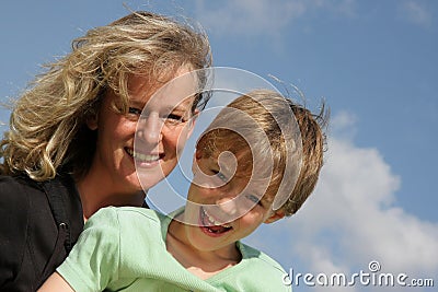 Smiling mother with laughing son Stock Photo