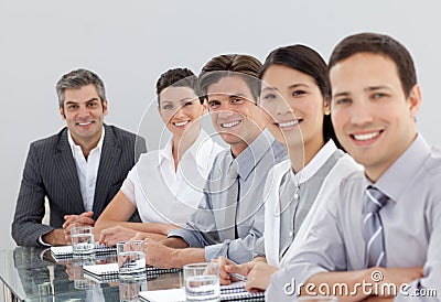 Smiling multi-ethnic business people in a meeting Stock Photo