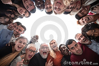 Smiling multiethnic group look down at the camera Stock Photo